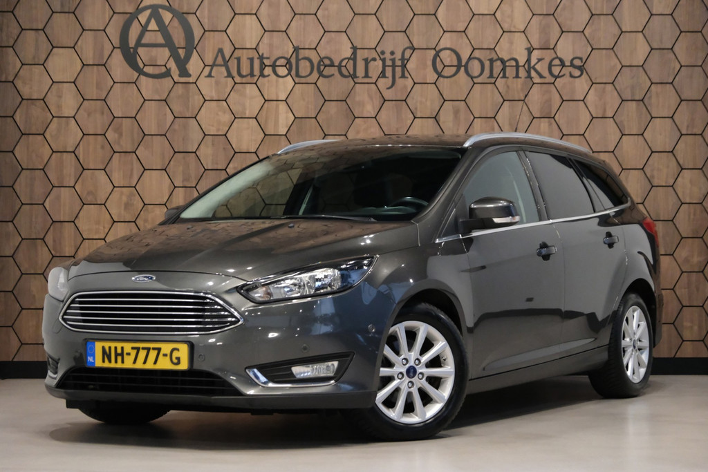 Ford Focus Wagon 1.0 Titanium*Cruise control*Navi*Stoelverwarming* 56911136-0.jpg | Autobedrijf Oomkes