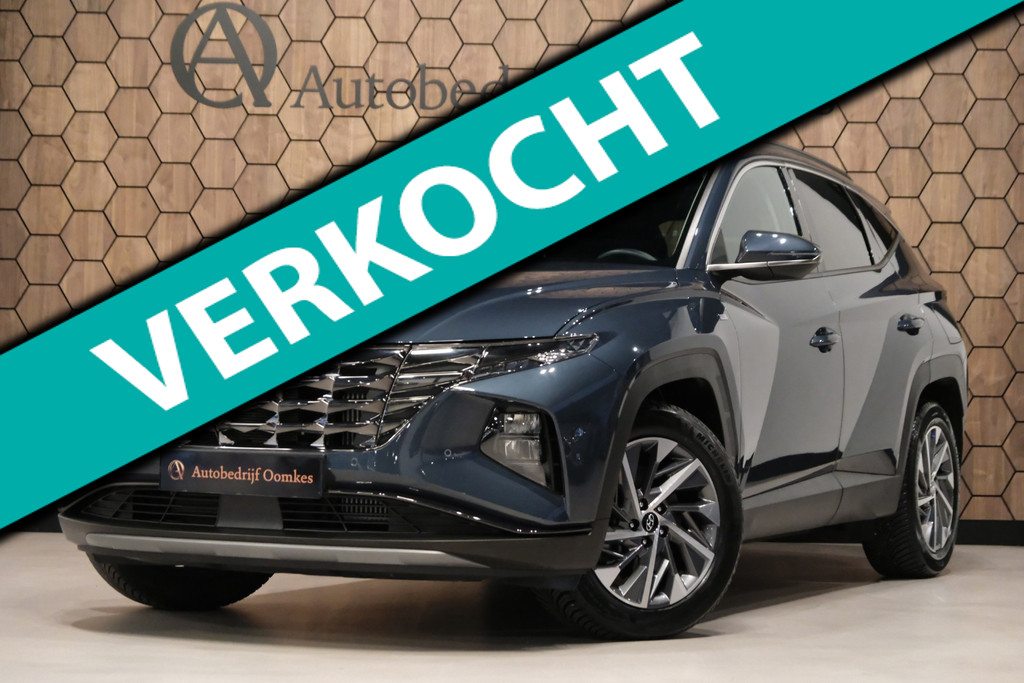 Hyundai Tucson 1.6 T-GDI MHEV **Als Nieuw 23.493km** All-Season Michelin |Navi/Camera| DEALER Onderhouden 56089720-0.jpg | Autobedrijf Oomkes